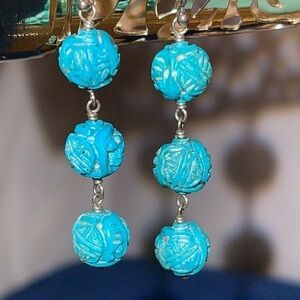 Turquoise drop carved ball earrings 2” Length